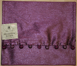 Purple glitter table runner.